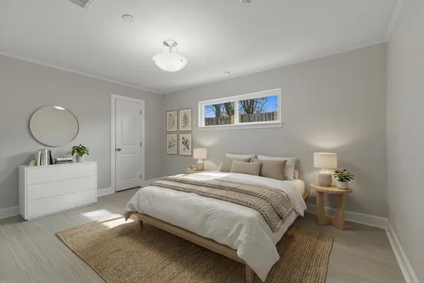 an aerial view of a house with a yard basket ball court