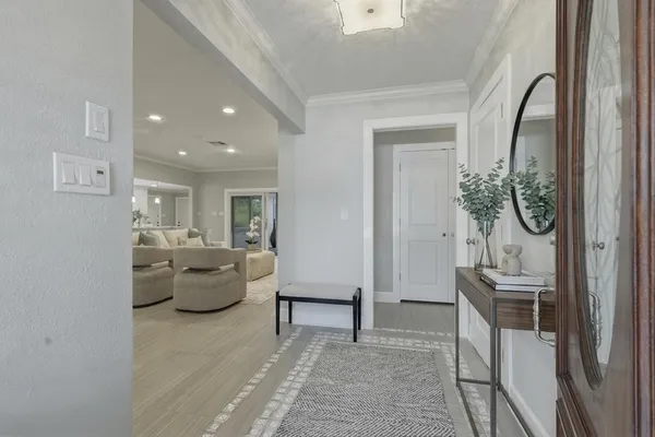 a living room with furniture and a table