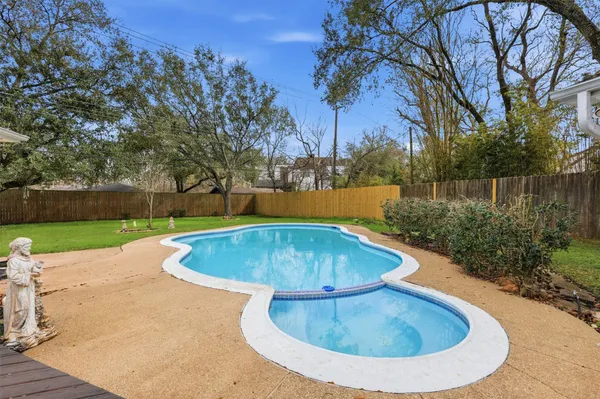 $529,900 | 9323 Braes Bayou Drive, Houston, TX 77074