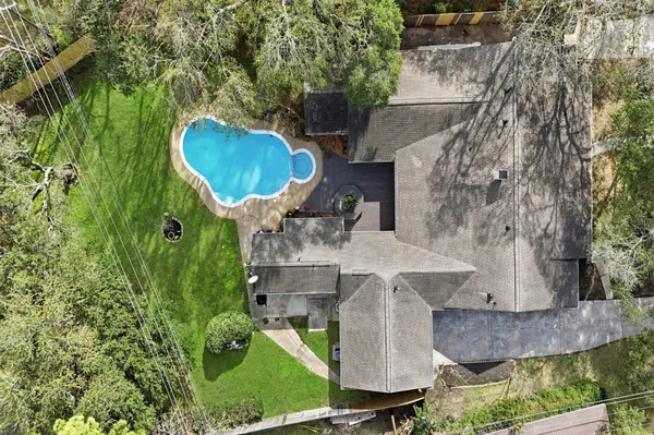 $529,900 | 9323 Braes Bayou Drive, Houston, TX 77074