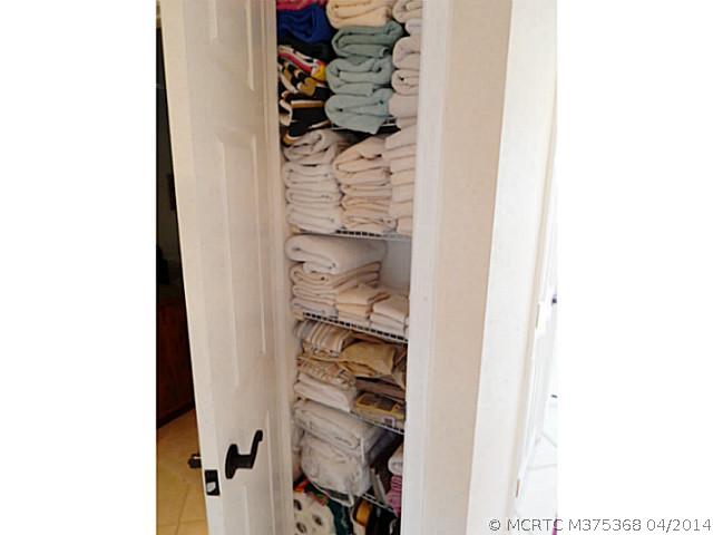 1868 Southwest Palm City Road, Unit 103 Stuart, FL 34994 - Photo 19 of 25 Other. Fully supplied linen closet