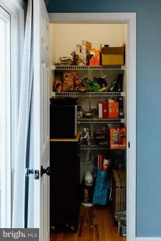 a room with lots of bottles of alcohol