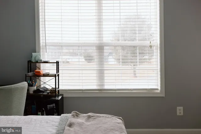 a living room with a flat screen tv