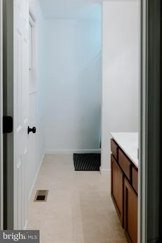 a picture of a bathroom with a shower curtain
