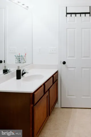 a view of a house with a small yard and plants