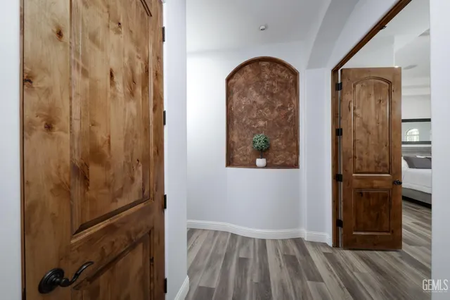 a bedroom with a bed and ceiling fan
