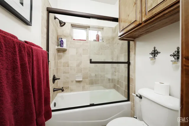 a bathroom with a sink vanity and a mirror