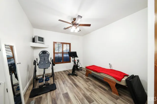 a living room with a couch and a chandelier