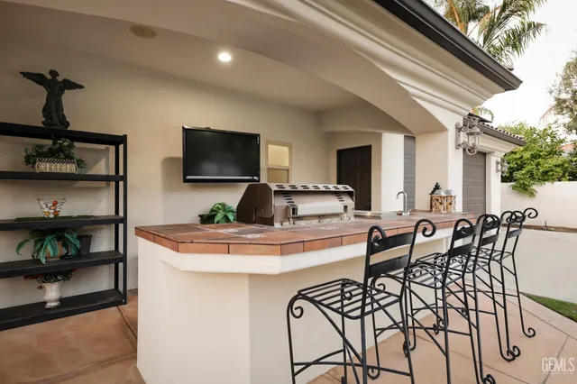 an aerial view of multiple houses with yard