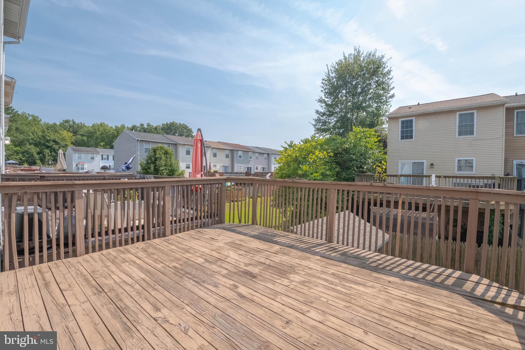 423 Kosoak Road Baltimore, MD 21220 - Photo 15 of 18 a balcony with wooden floor and fence