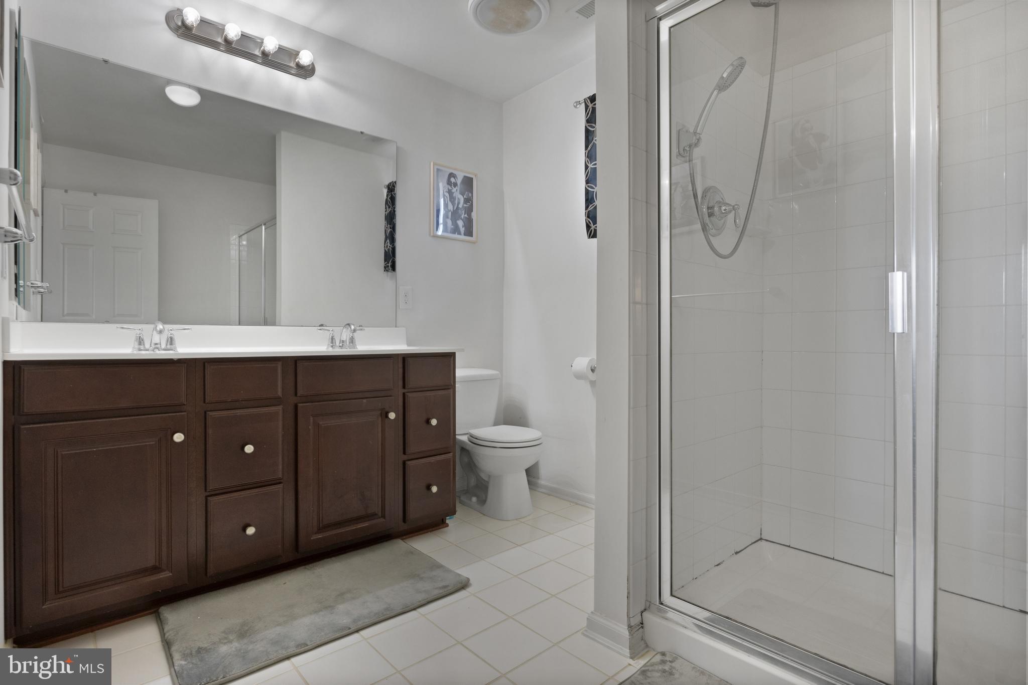 2 Tieman Circle Delanco, NJ 08075 - Photo 22 of 30 a bathroom with a double vanity sink toilet and shower