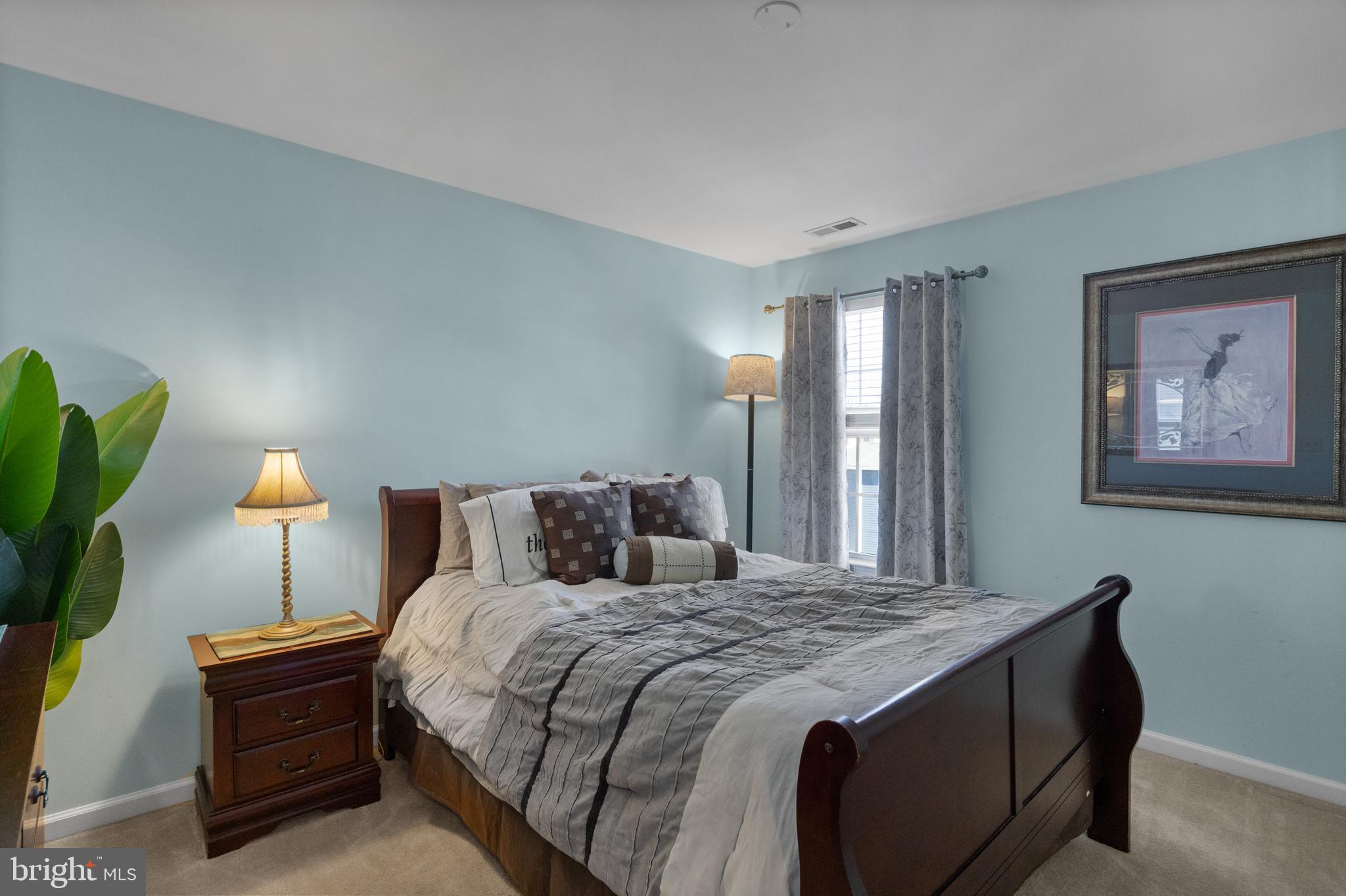 2 Tieman Circle Delanco, NJ 08075 - Photo 24 of 30 a bedroom with a bed and a lamp on dresser