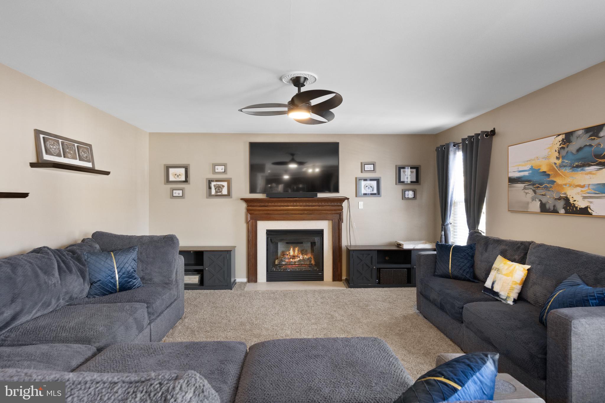 2 Tieman Circle Delanco, NJ 08075 - Photo 10 of 30 a living room with furniture a fireplace and a flat screen tv