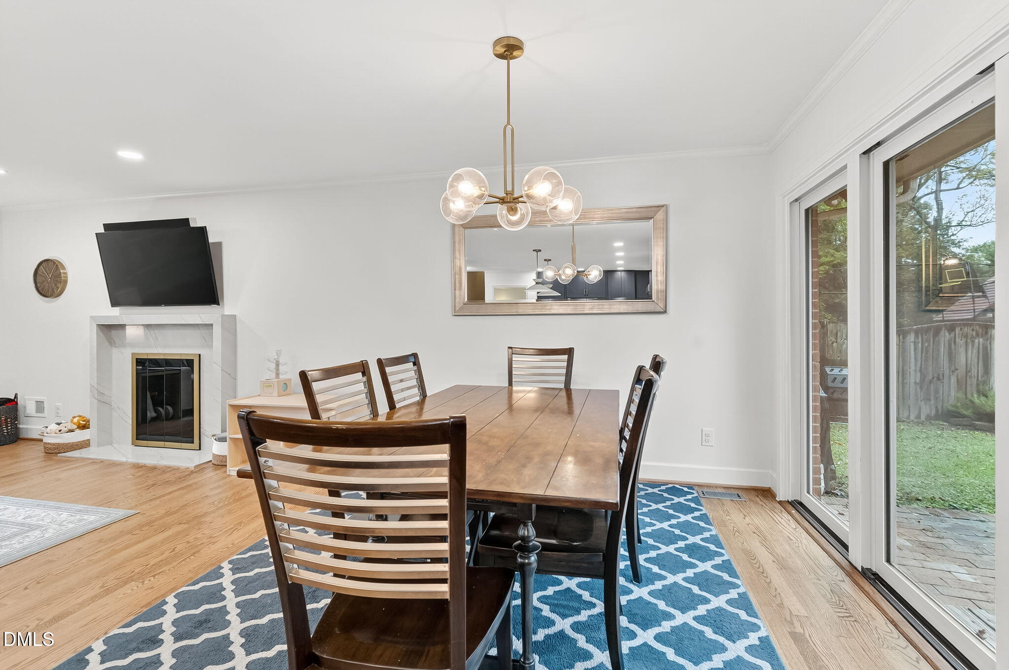 4206 Laurel Ridge Drive Raleigh, NC 27612 - Photo 11 of 62 a view of a dining room with furniture window and wooden floor