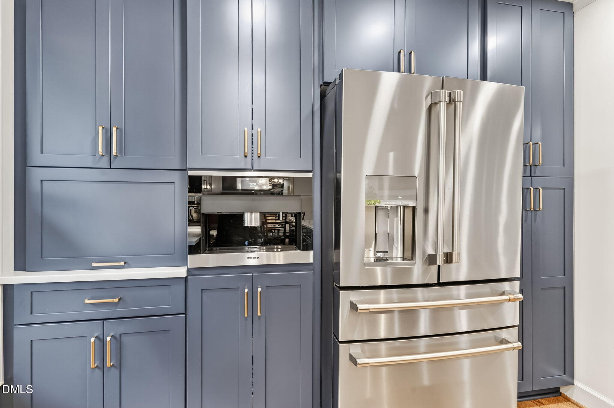 4206 Laurel Ridge Drive Raleigh, NC 27612 - Photo 13 of 62 a kitchen with stainless steel appliances a refrigerator and cabinets