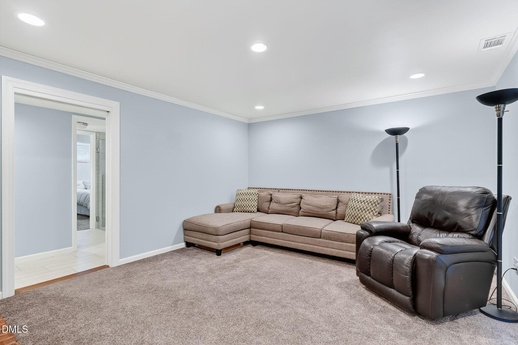 4206 Laurel Ridge Drive Raleigh, NC 27612 - Photo 17 of 62 a living room with furniture and a couch