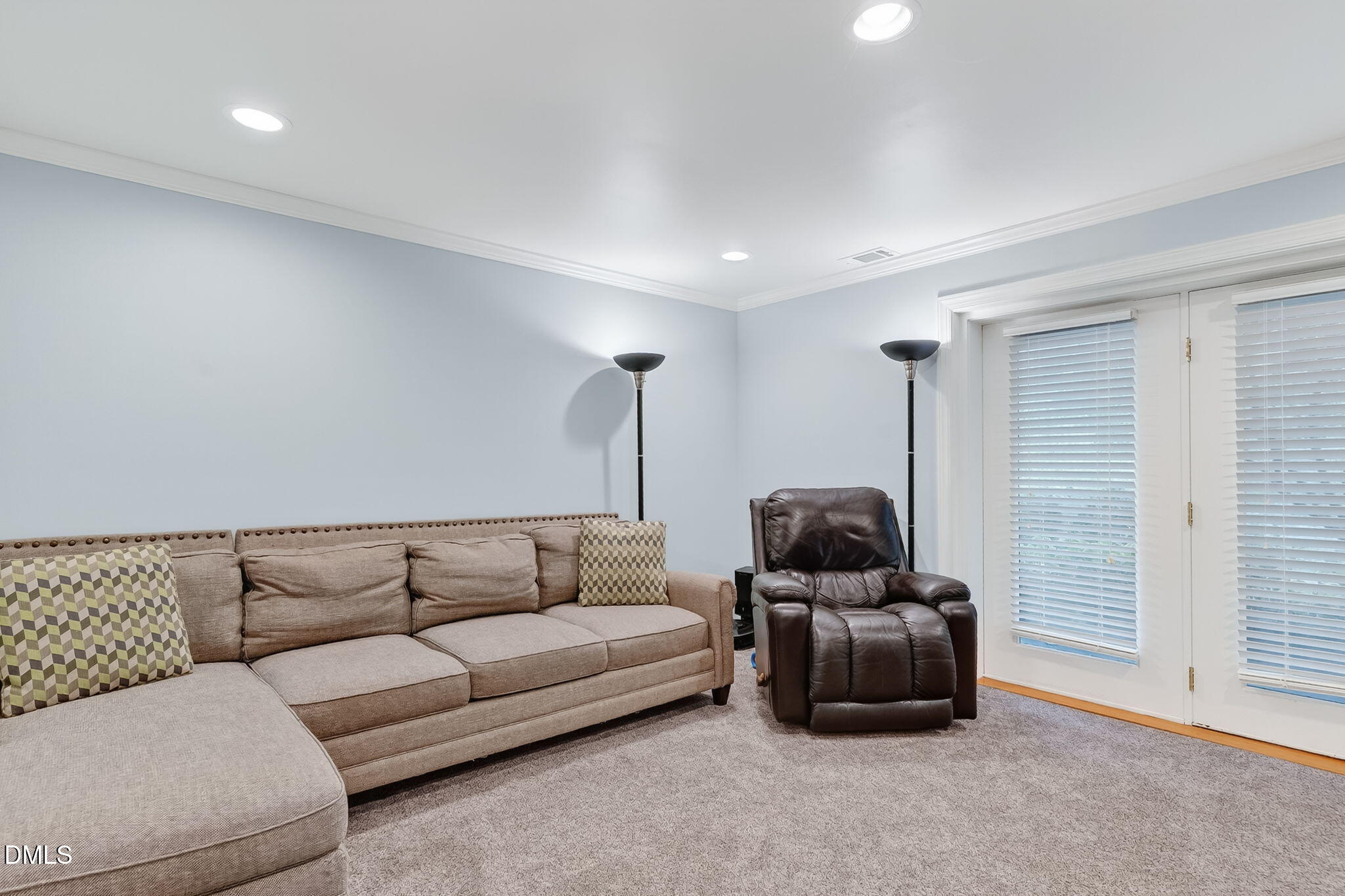 4206 Laurel Ridge Drive Raleigh, NC 27612 - Photo 18 of 62 a living room with furniture and a window