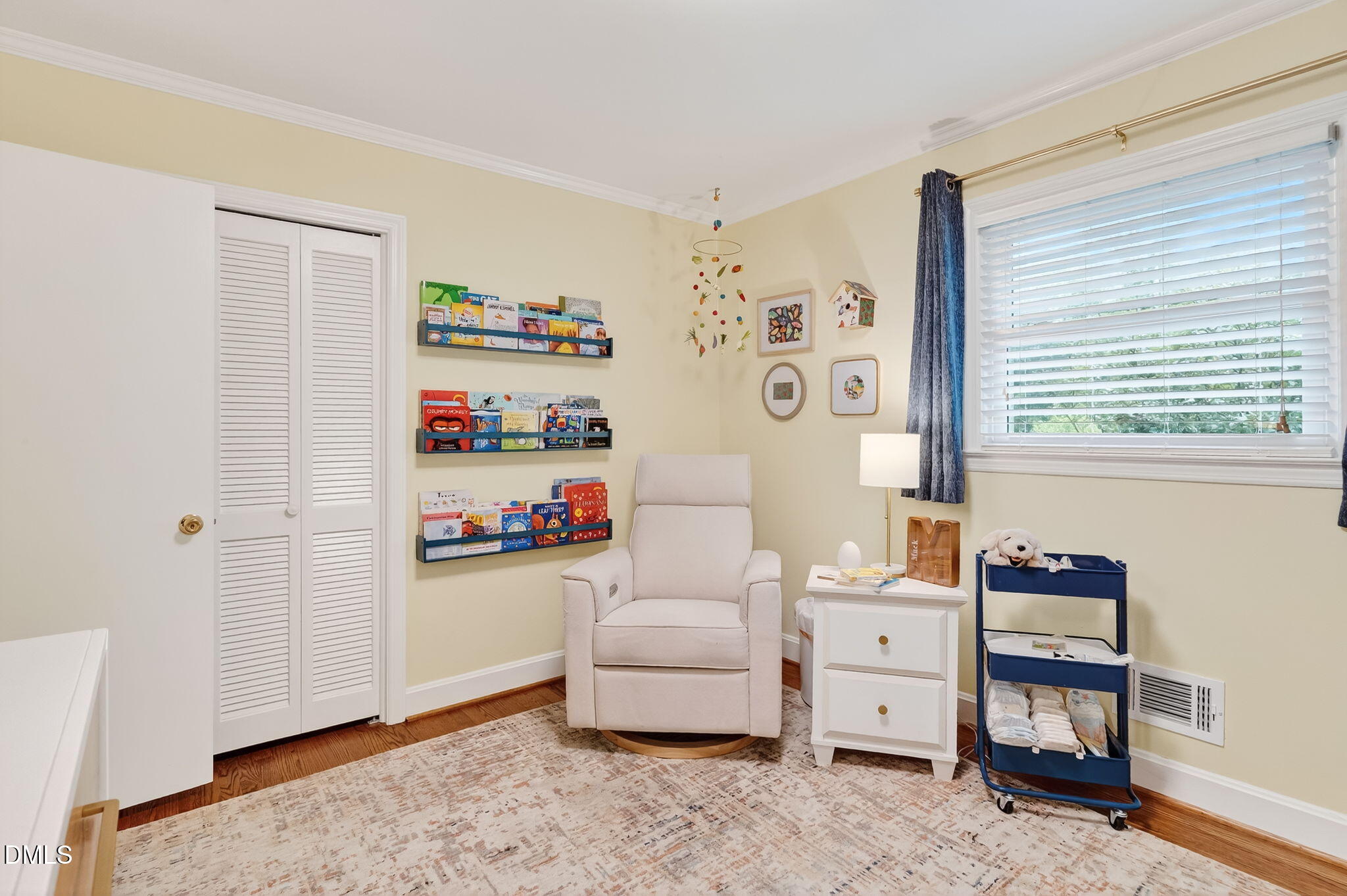 4206 Laurel Ridge Drive Raleigh, NC 27612 - Photo 27 of 62 a bedroom with furniture and a window