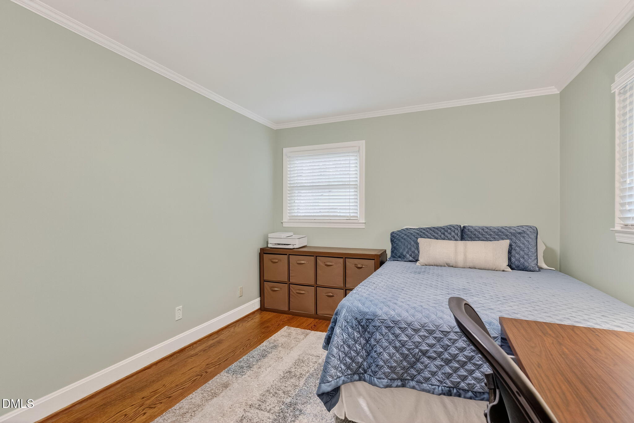 4206 Laurel Ridge Drive Raleigh, NC 27612 - Photo 31 of 62 a bedroom with a bed and window