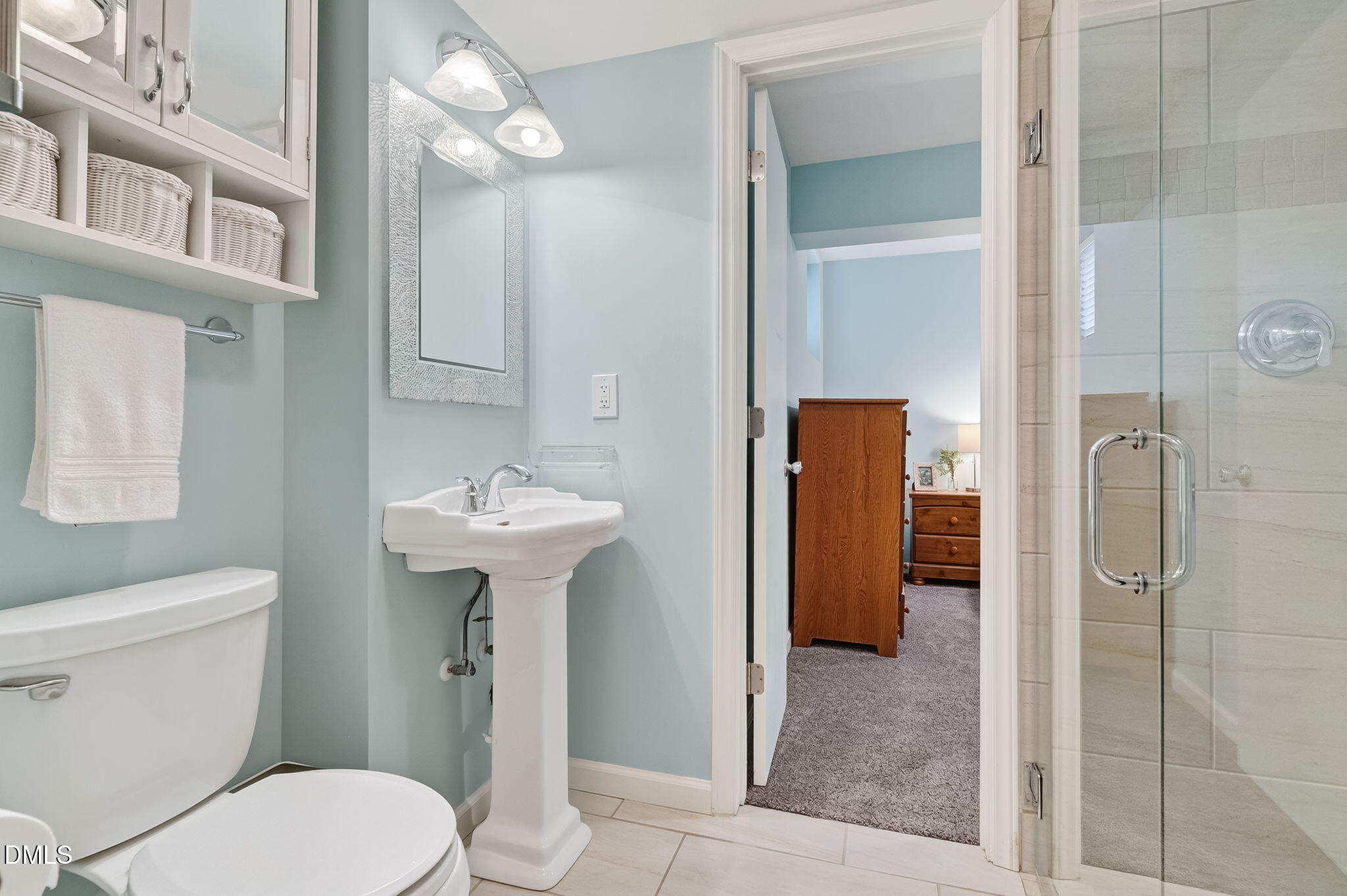 4206 Laurel Ridge Drive Raleigh, NC 27612 - Photo 35 of 62 a bathroom with a sink toilet and shower