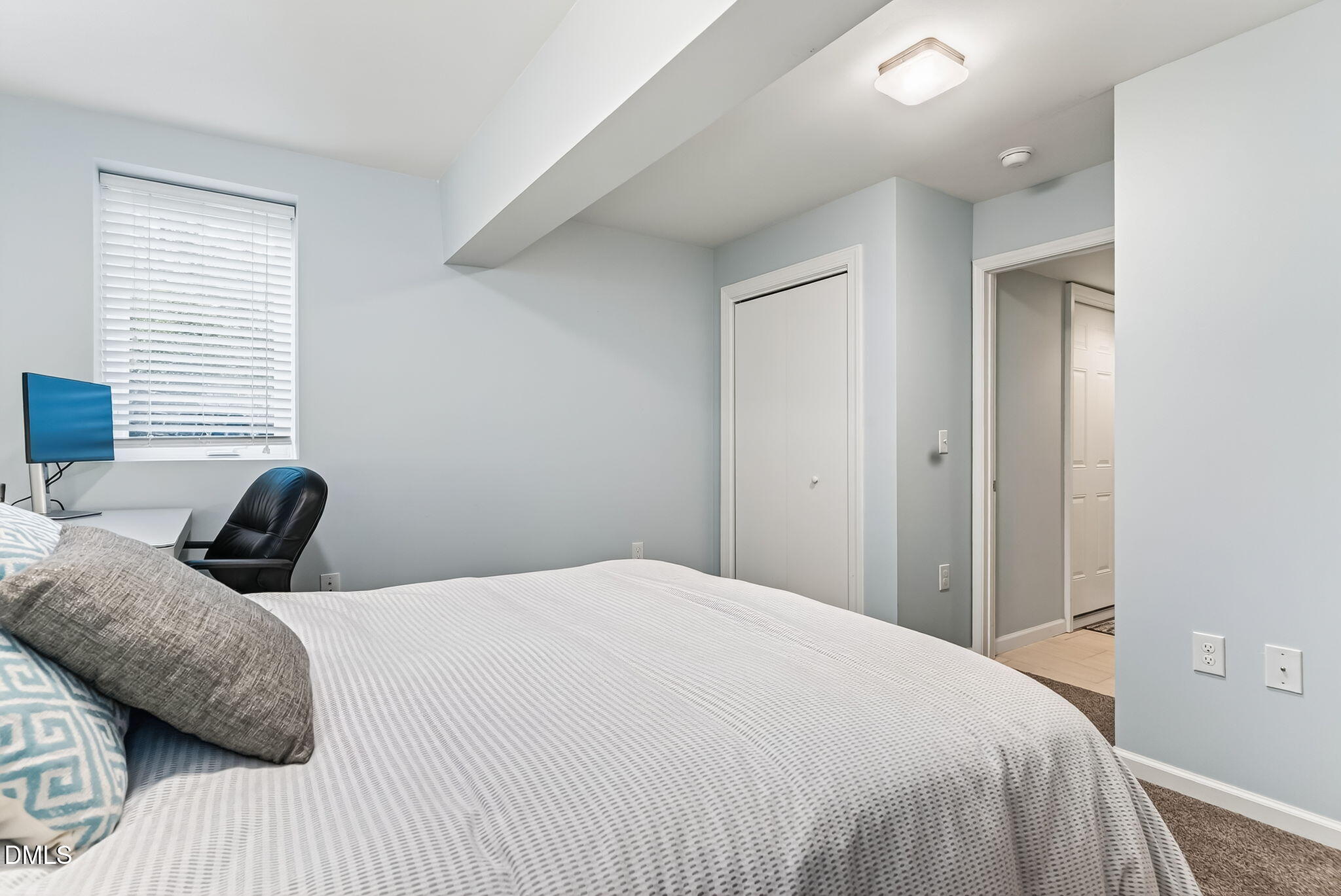 4206 Laurel Ridge Drive Raleigh, NC 27612 - Photo 36 of 62 a bedroom with a bed and a window