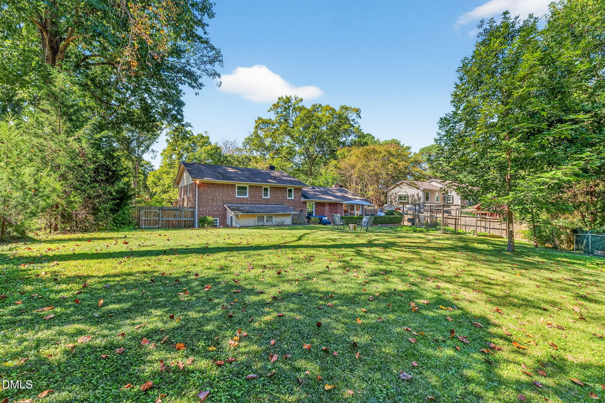 4206 Laurel Ridge Drive Raleigh, NC 27612 - Photo 45 of 62 a front view of a house with a garden