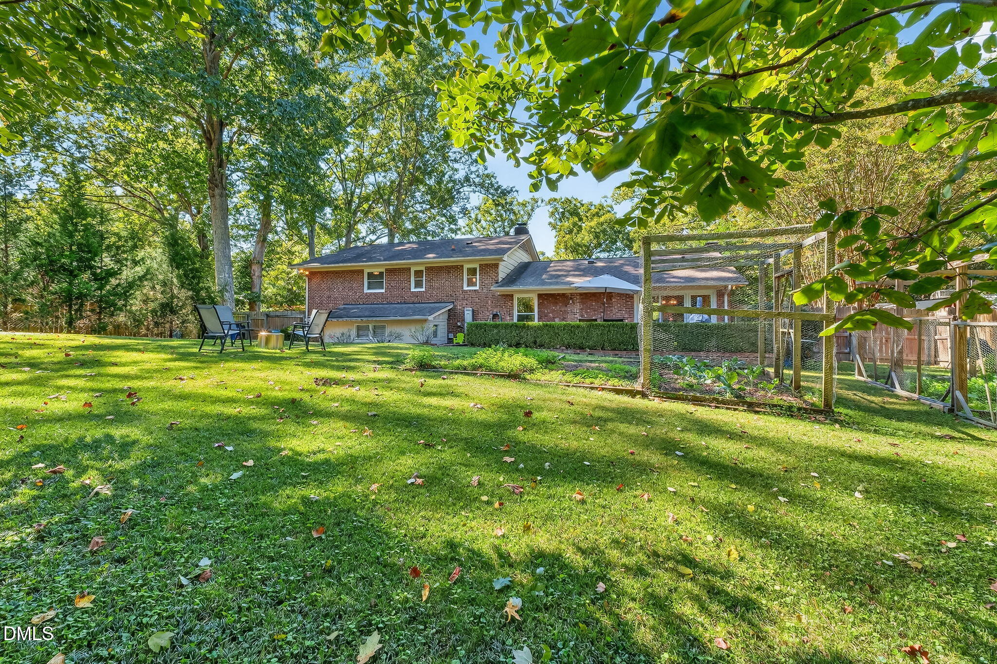 4206 Laurel Ridge Drive Raleigh, NC 27612 - Photo 47 of 62 a view of a house with a big yard