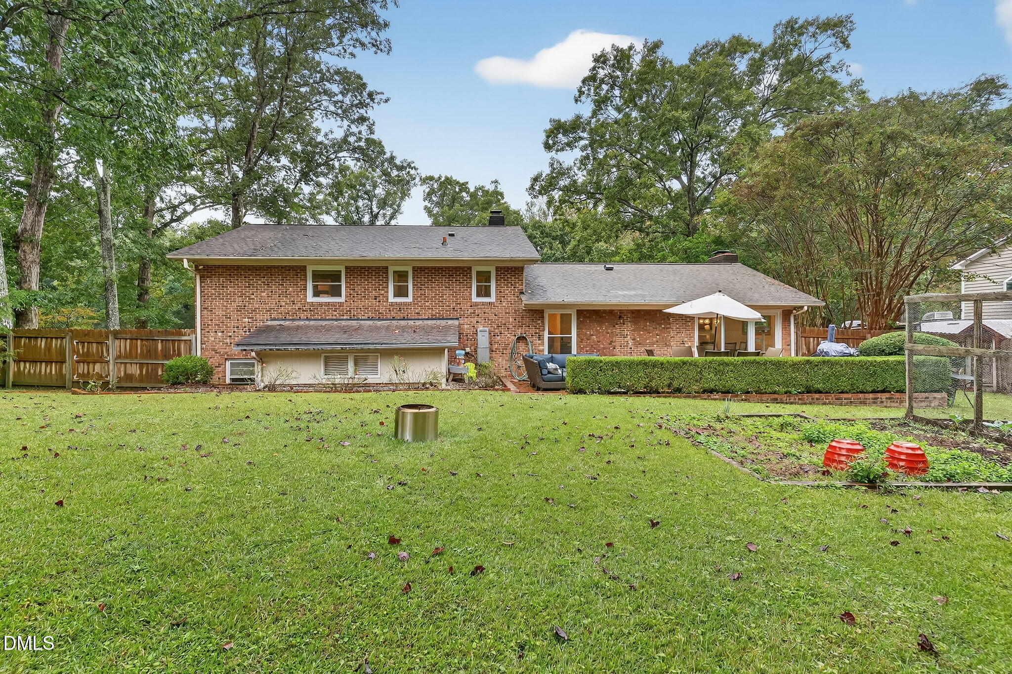 4206 Laurel Ridge Drive Raleigh, NC 27612 - Photo 48 of 62 a front view of house with yard and green space