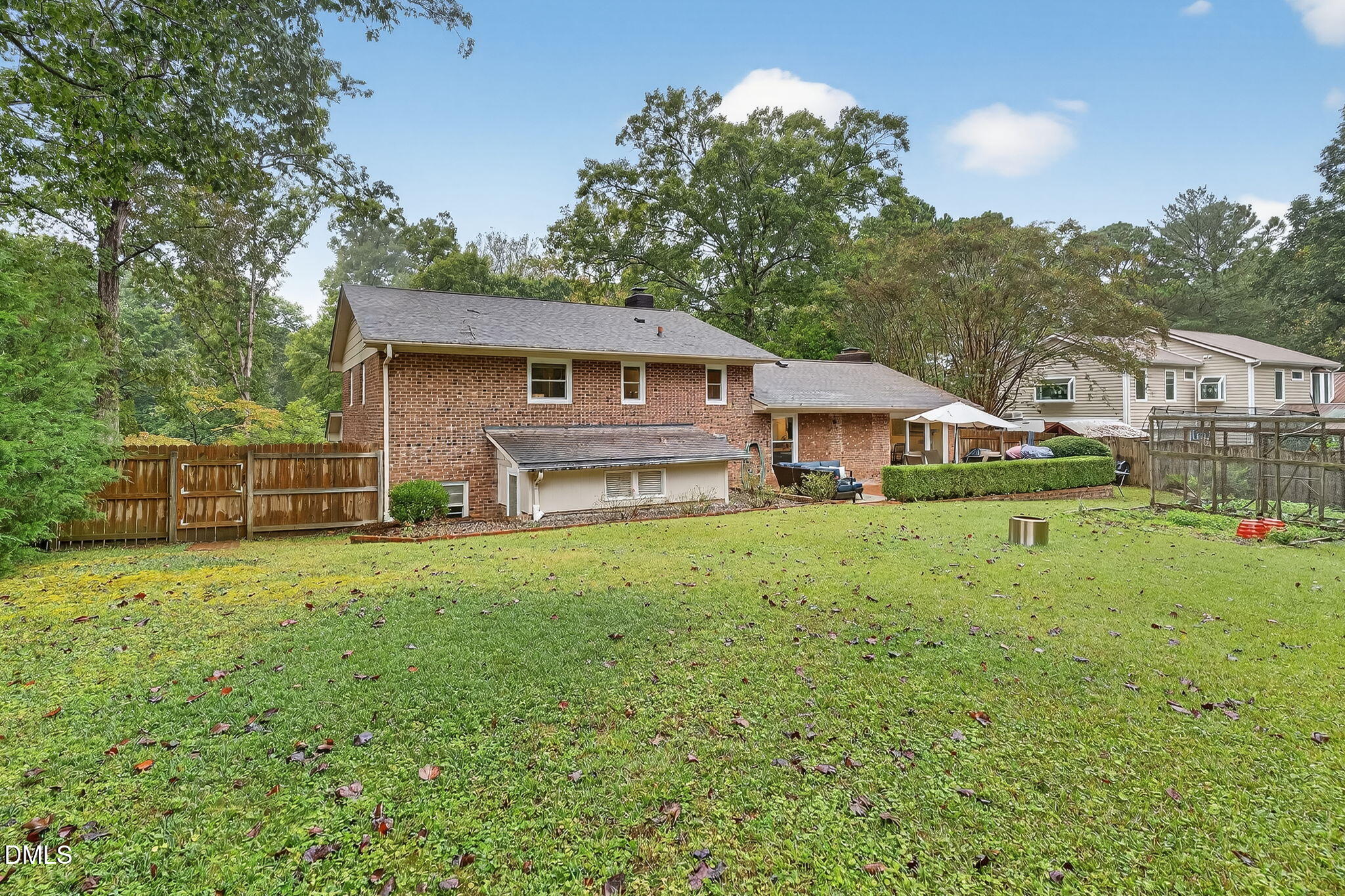 4206 Laurel Ridge Drive Raleigh, NC 27612 - Photo 49 of 62 a front view of a house with a yard