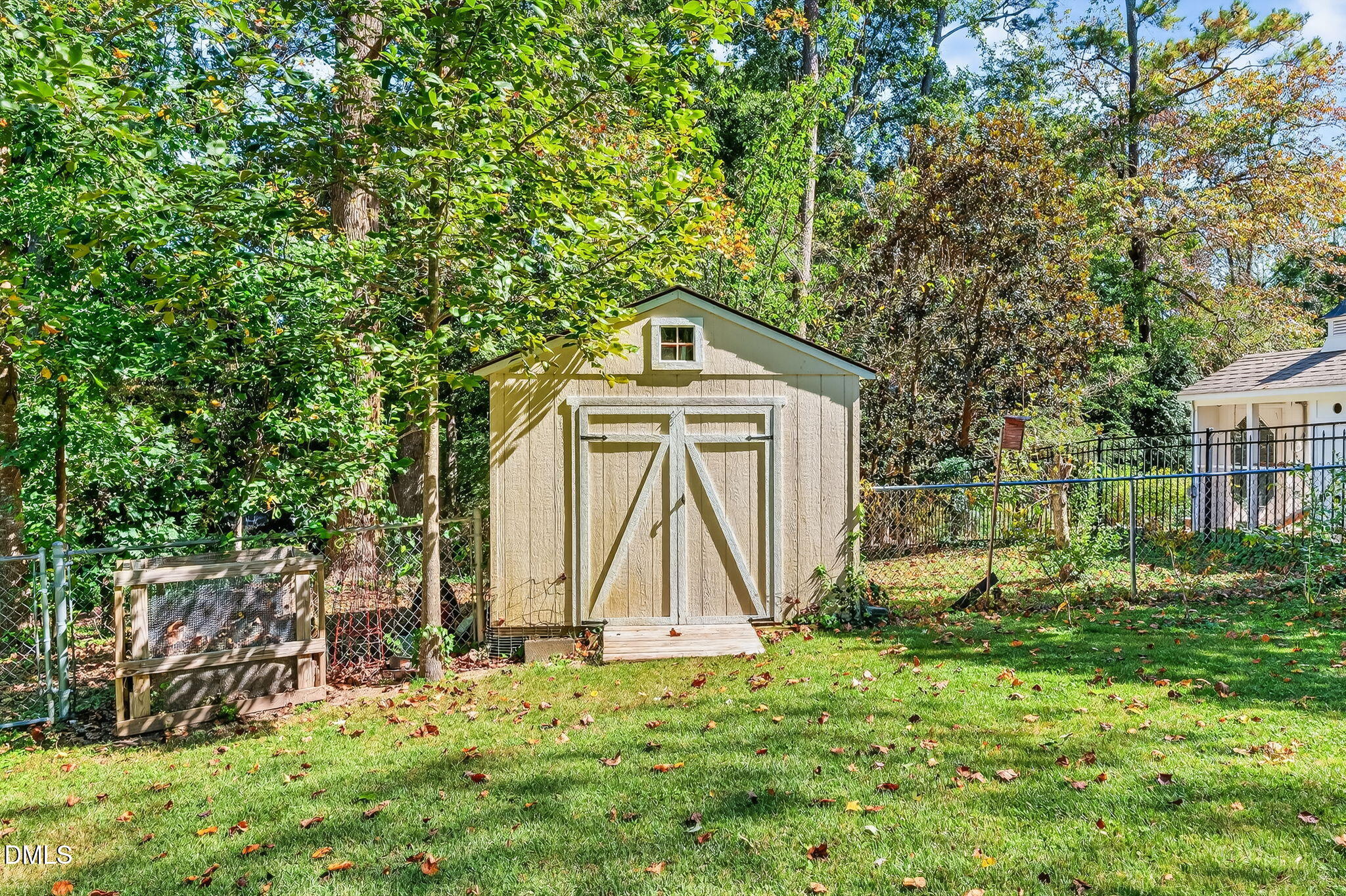 4206 Laurel Ridge Drive Raleigh, NC 27612 - Photo 51 of 62 a front view of a house with a yard