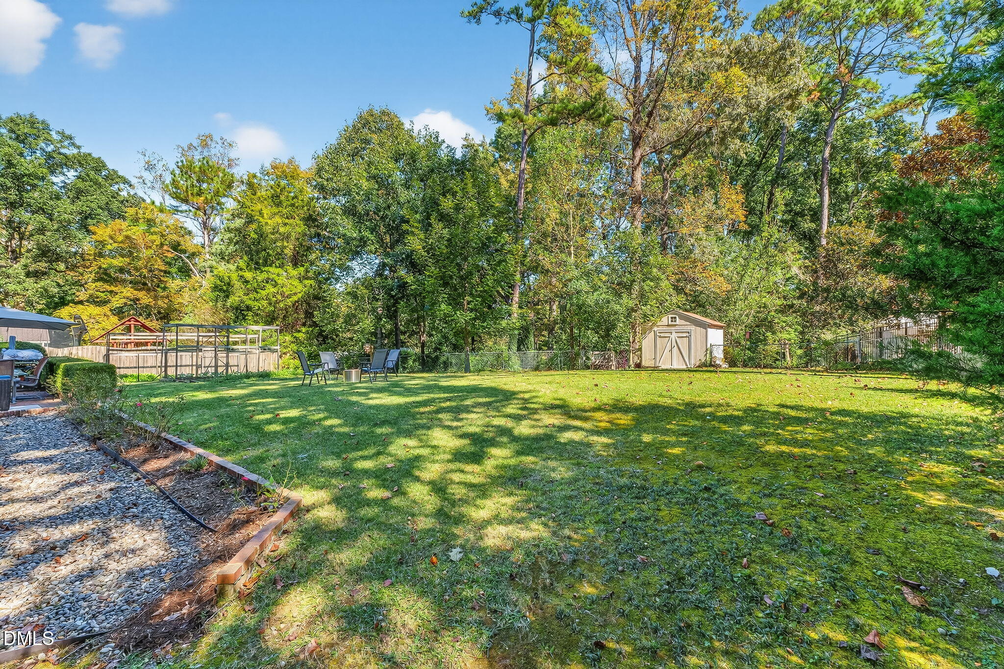 4206 Laurel Ridge Drive Raleigh, NC 27612 - Photo 53 of 62 a view of a golf course with a tree