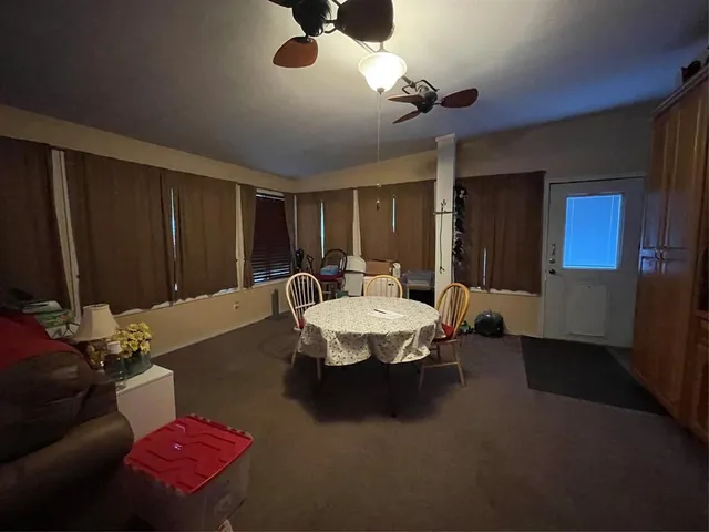 a kitchen with stainless steel appliances a stove a sink and cabinets