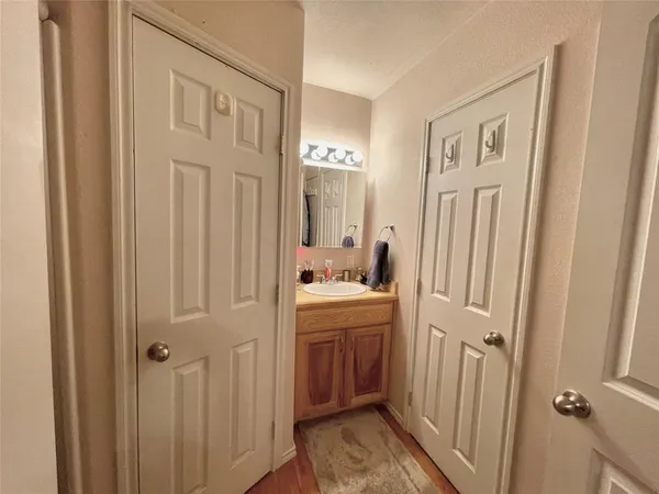 a bathroom with a shower and a door