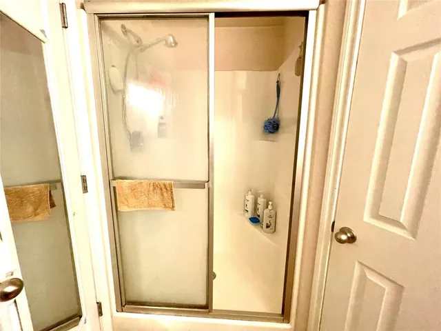 a view of a trees in front of a house