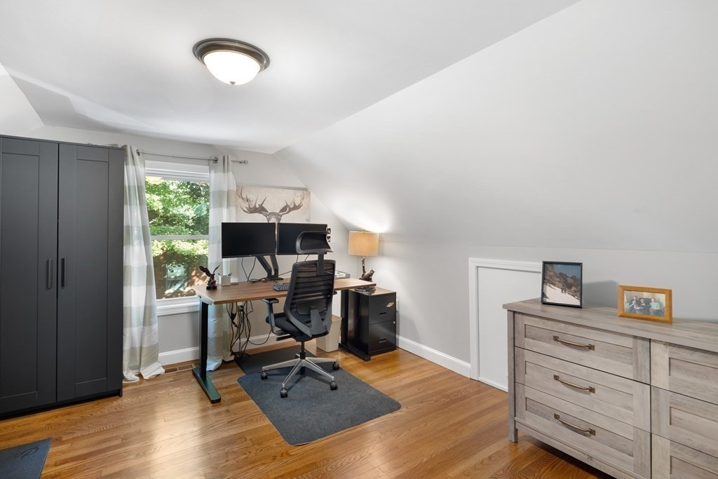 25 Eames Street North Reading, MA 01864 - Photo 17 of 25 a view of a workspace with furniture and a window