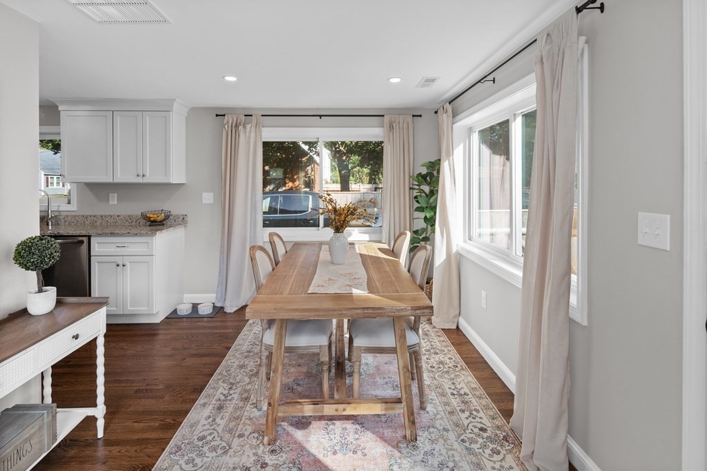 25 Eames Street North Reading, MA 01864 - Photo 9 of 25 a living room with furniture and a rug
