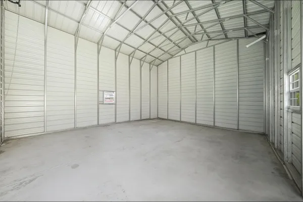 a view of a room with white walls