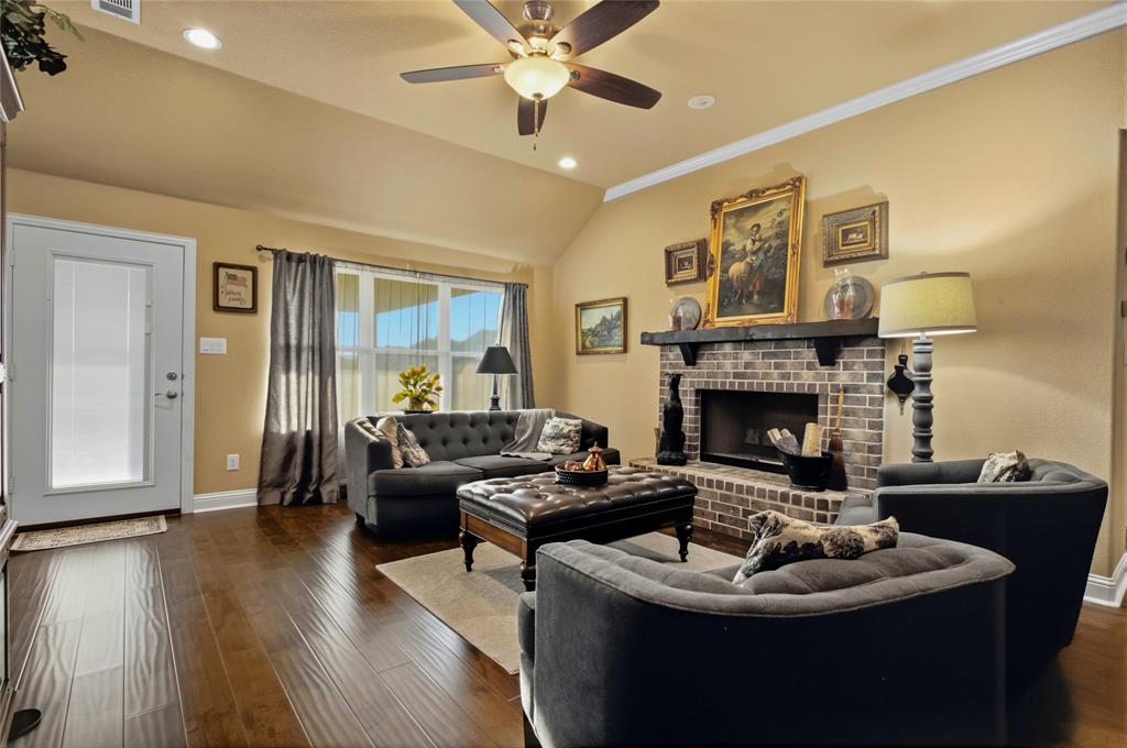 3911 Bennett Road Howe, TX 75459 - Photo 6 of 34 High ceilings and bright natural light in the living room seem to say, "Come in and sit a while."