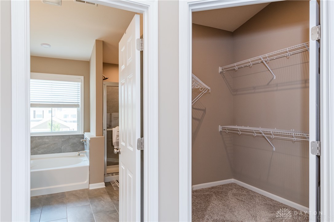 146 Rippling Brook Lane Springboro, OH 45066 - Photo 18 of 42 Primary bedroom has two walk-in closets plus linen closet.