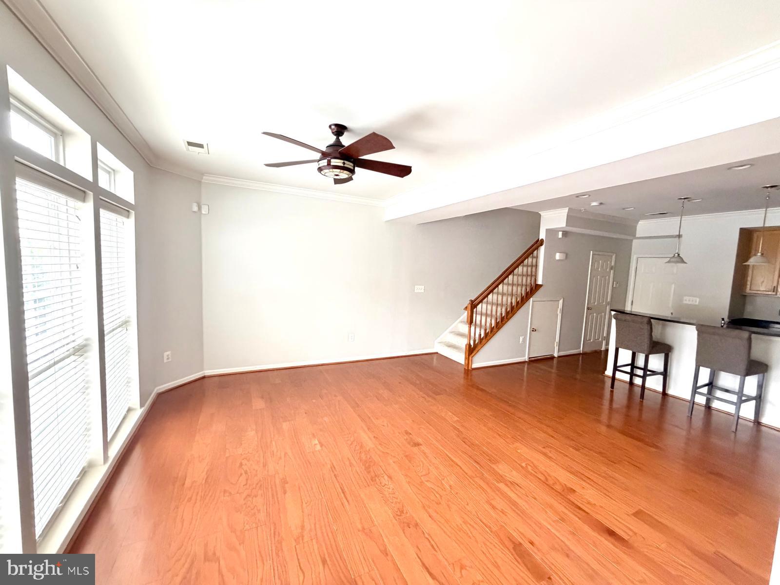 7248 Elkridge Crossing Way Elkridge, MD 21075 - Photo 11 of 47 a view of entryway and hall with wooden floor