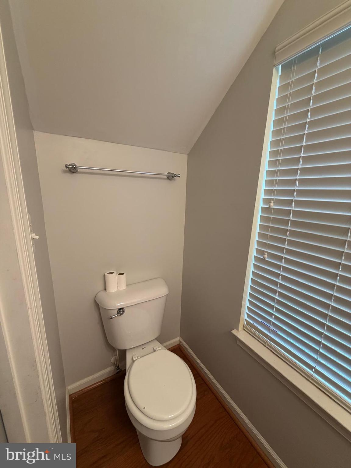 7248 Elkridge Crossing Way Elkridge, MD 21075 - Photo 15 of 47 a bathroom with a toilet a sink and a mirror