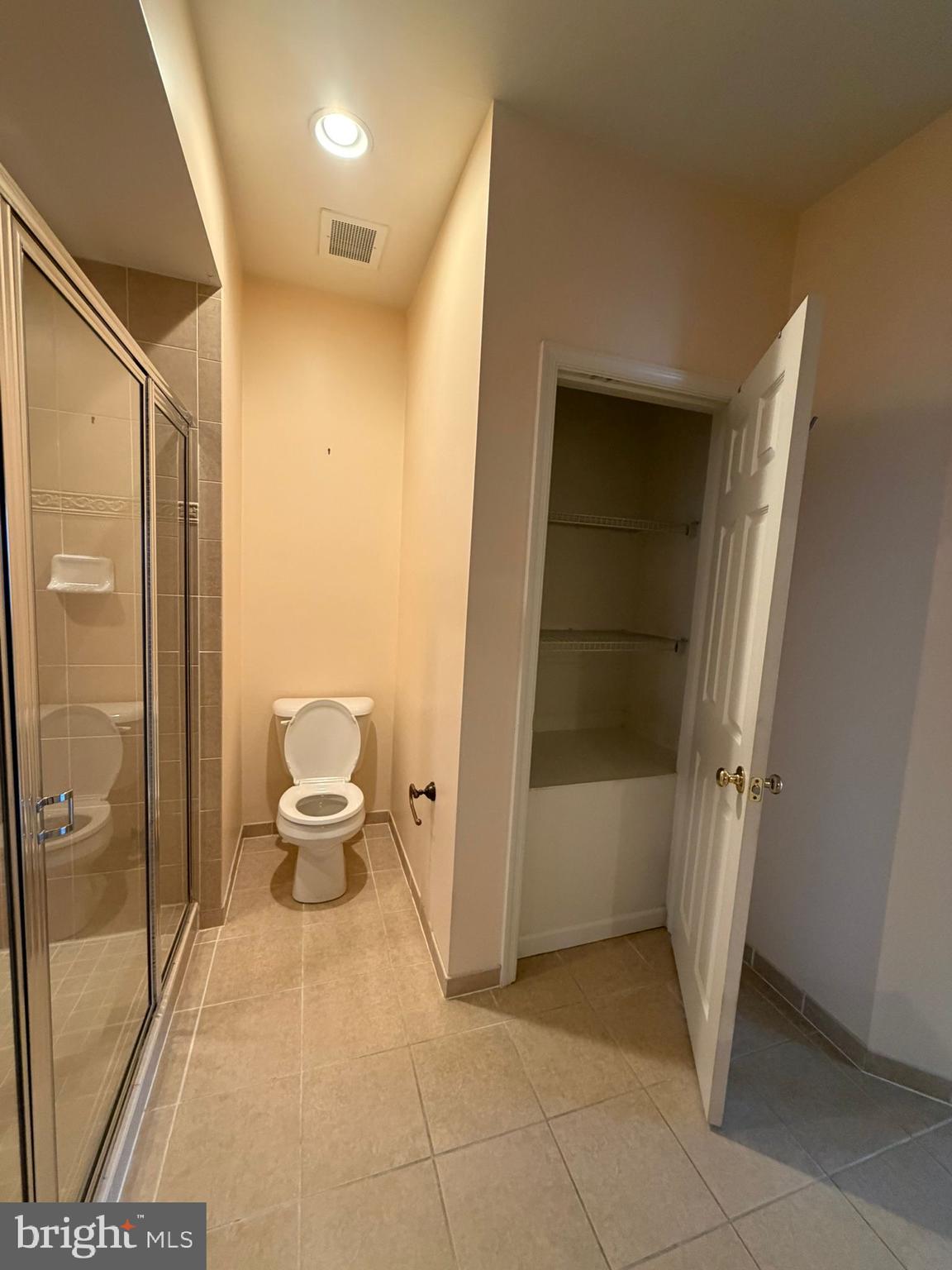 7248 Elkridge Crossing Way Elkridge, MD 21075 - Photo 20 of 47 a bathroom with a toilet and a shower