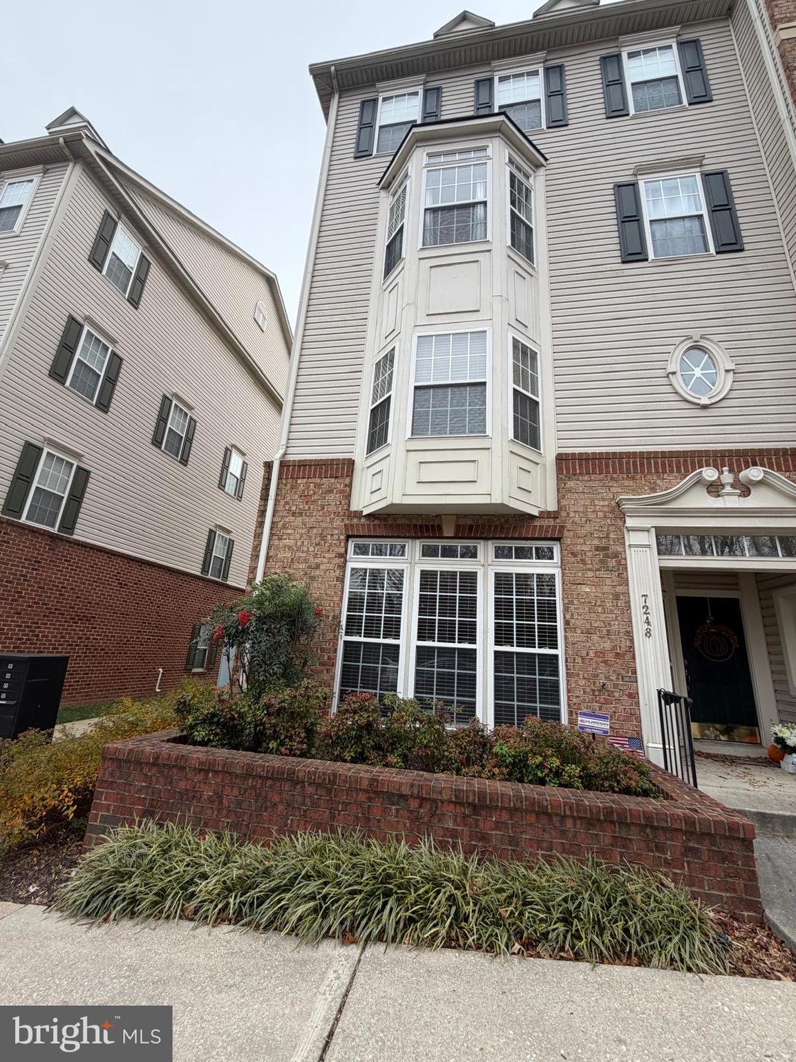 7248 Elkridge Crossing Way Elkridge, MD 21075 - Photo 2 of 47 a front view of a building