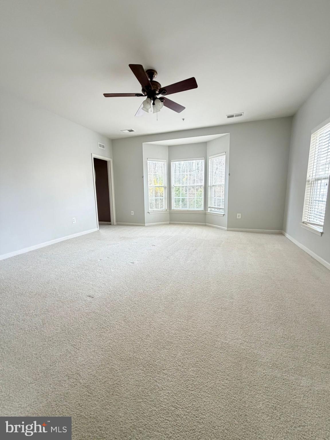 7248 Elkridge Crossing Way Elkridge, MD 21075 - Photo 24 of 47 a view of an empty room with a window