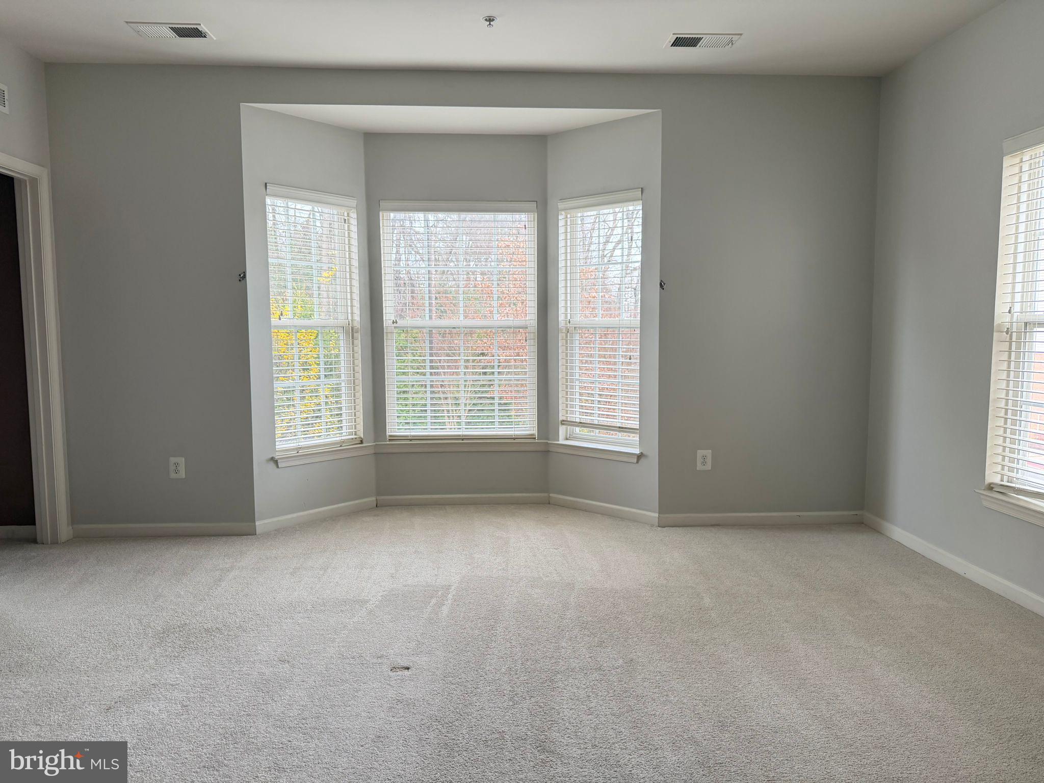 7248 Elkridge Crossing Way Elkridge, MD 21075 - Photo 26 of 47 an empty room with windows