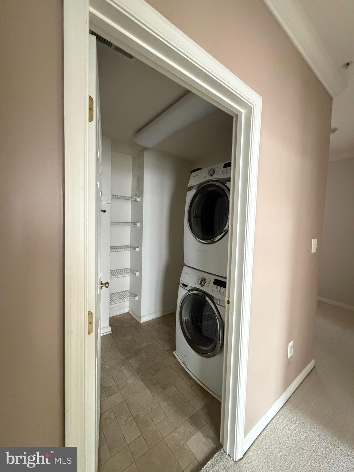 7248 Elkridge Crossing Way Elkridge, MD 21075 - Photo 29 of 47 a view of a hallway with washer and dryer