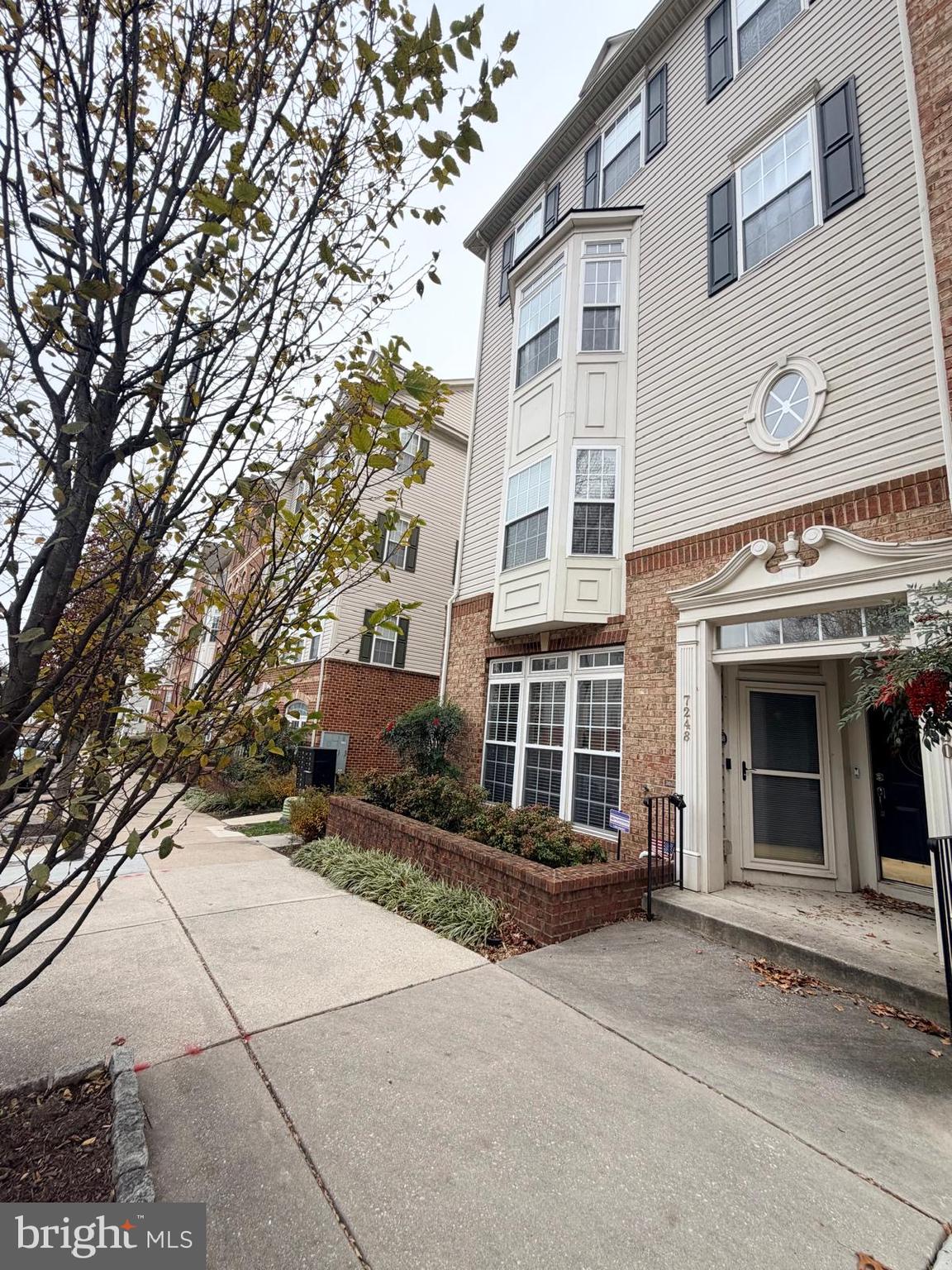 7248 Elkridge Crossing Way Elkridge, MD 21075 - Photo 3 of 47 a view of a building with a outdoor space