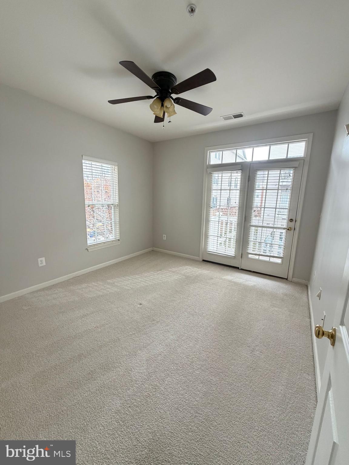 7248 Elkridge Crossing Way Elkridge, MD 21075 - Photo 39 of 47 a view of an empty room with a window