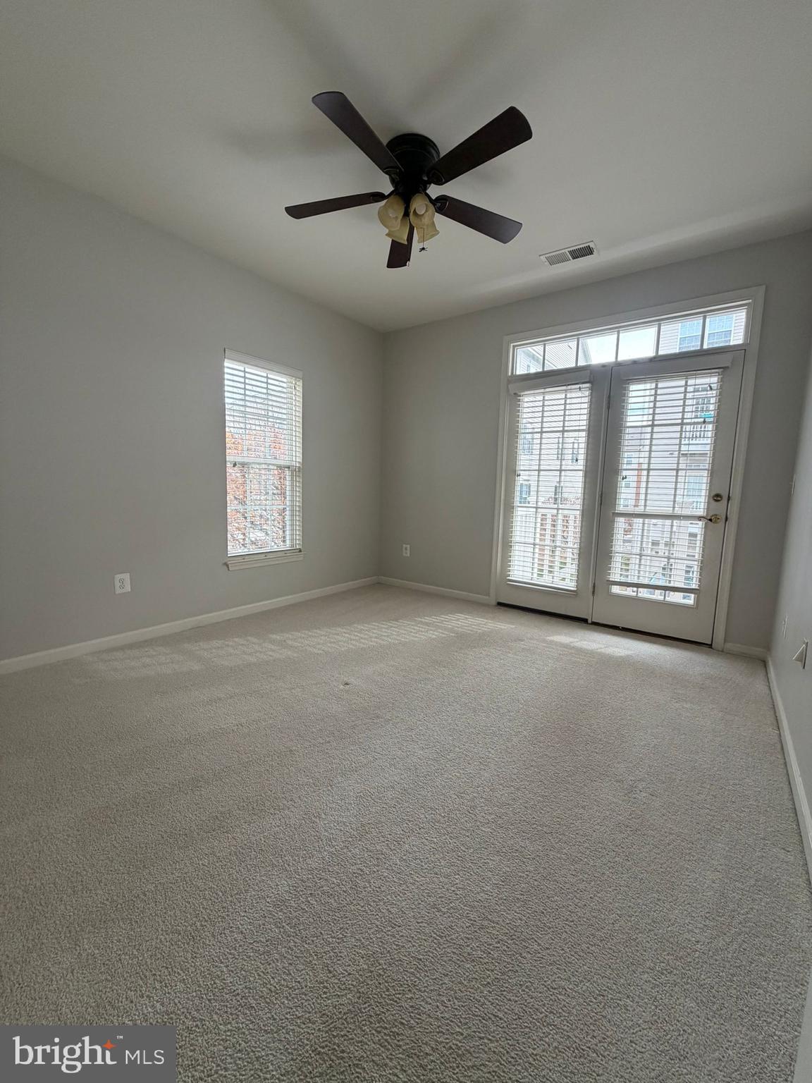 7248 Elkridge Crossing Way Elkridge, MD 21075 - Photo 40 of 47 a view of an empty room with a window