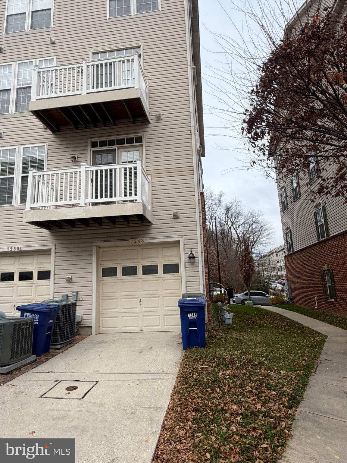 7248 Elkridge Crossing Way Elkridge, MD 21075 - Photo 42 of 47 a view of small house with a patio